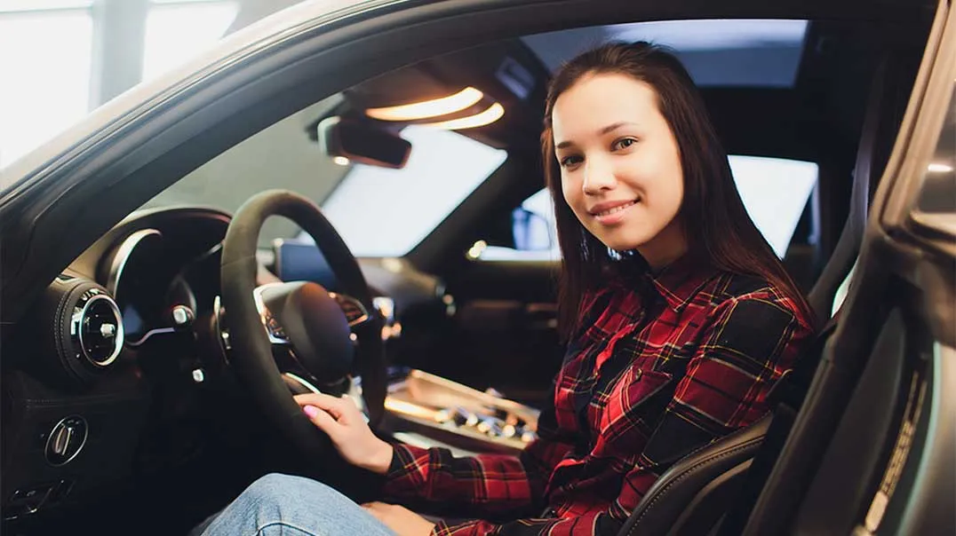 woman on a car
